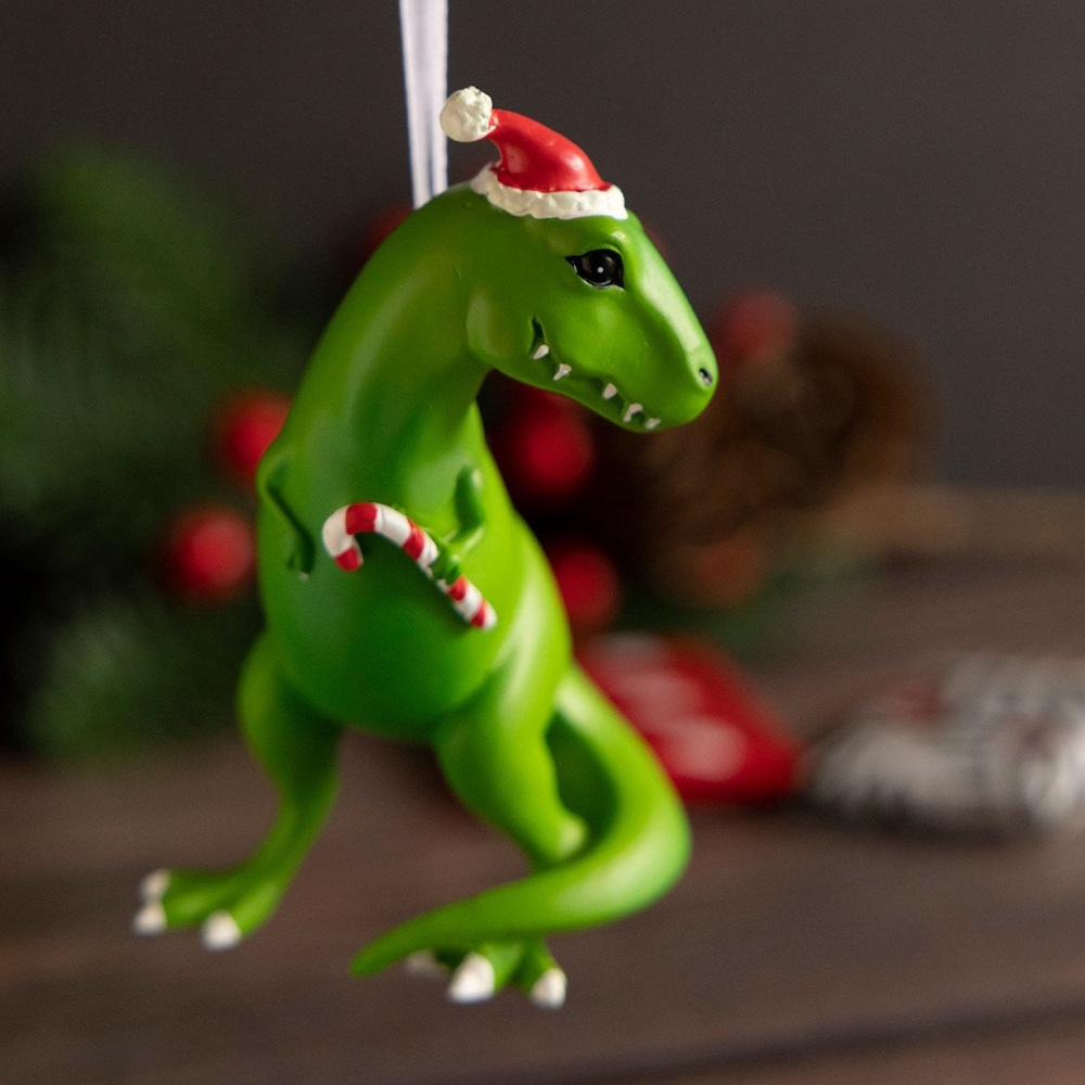 Christmas ornament t-rex green dinosaur in Santa’s hat
